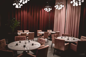 Elegant hotel restaurant with stylish tables and ambient lighting