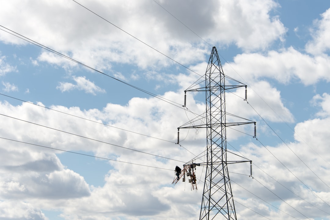 wires passing along transmission tower