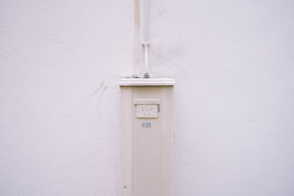 white switchplate on column