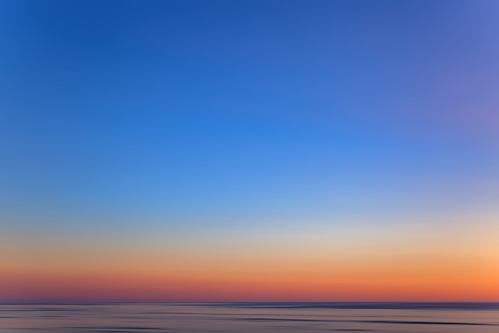 golden hour photography of ocean water