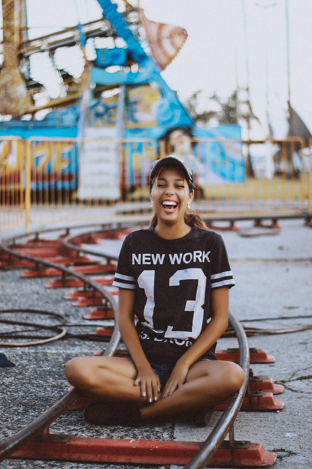 woman wearing black and white crew-neck t-shirt on carnaval