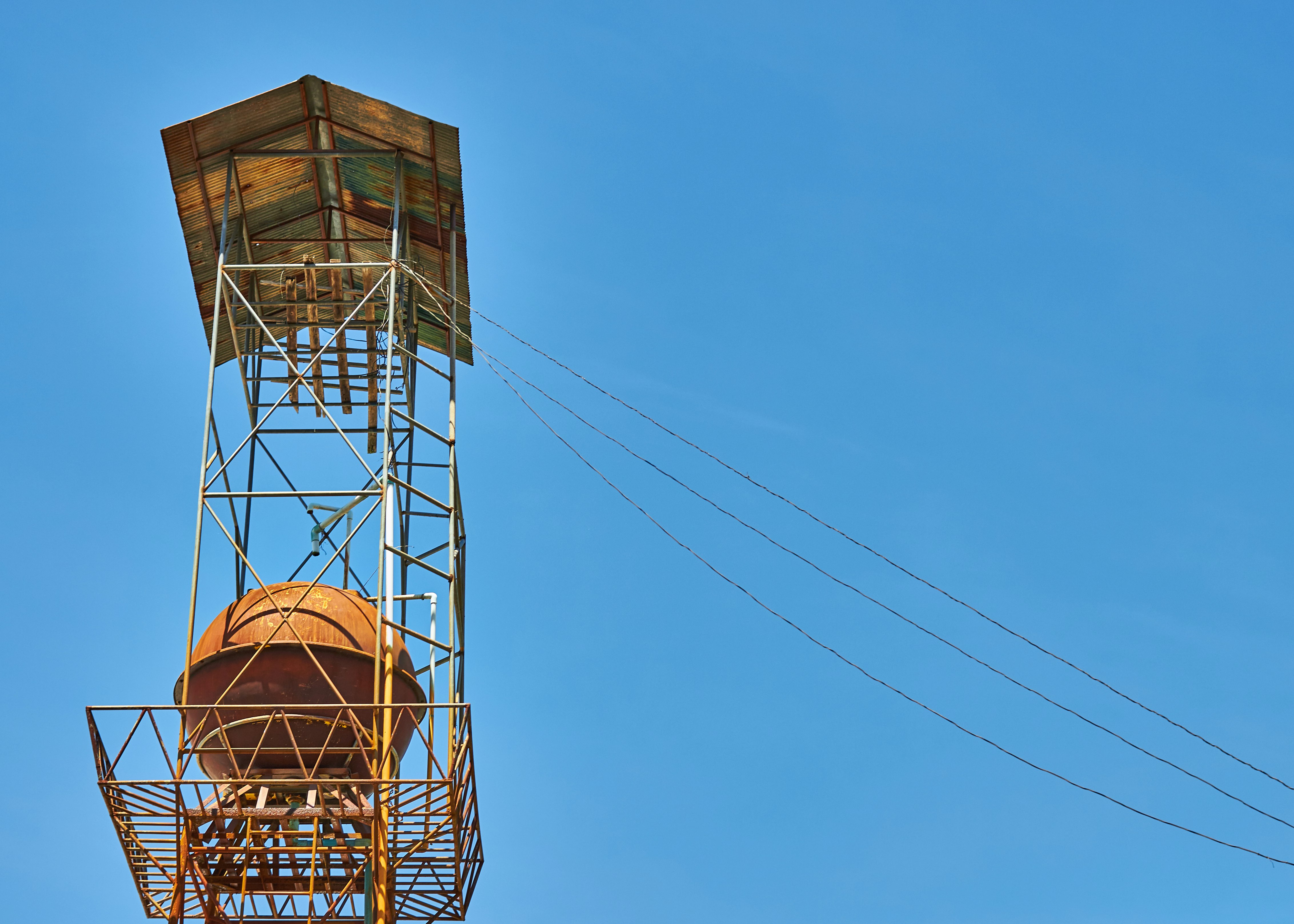 photo of tower with cables