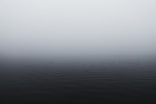 grayscale photography of body of water