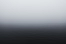 grayscale photography of body of water