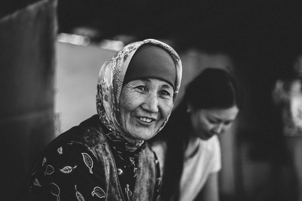 grayscale photo of a woman wearing hijab