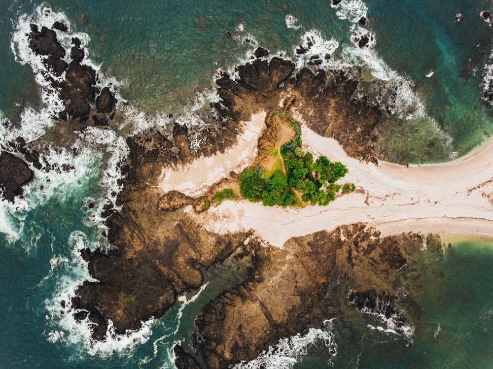 island surrounded by ocean water