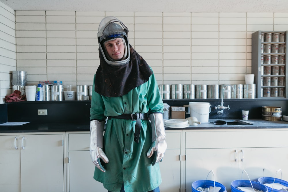 person wearing suit inside white painted room