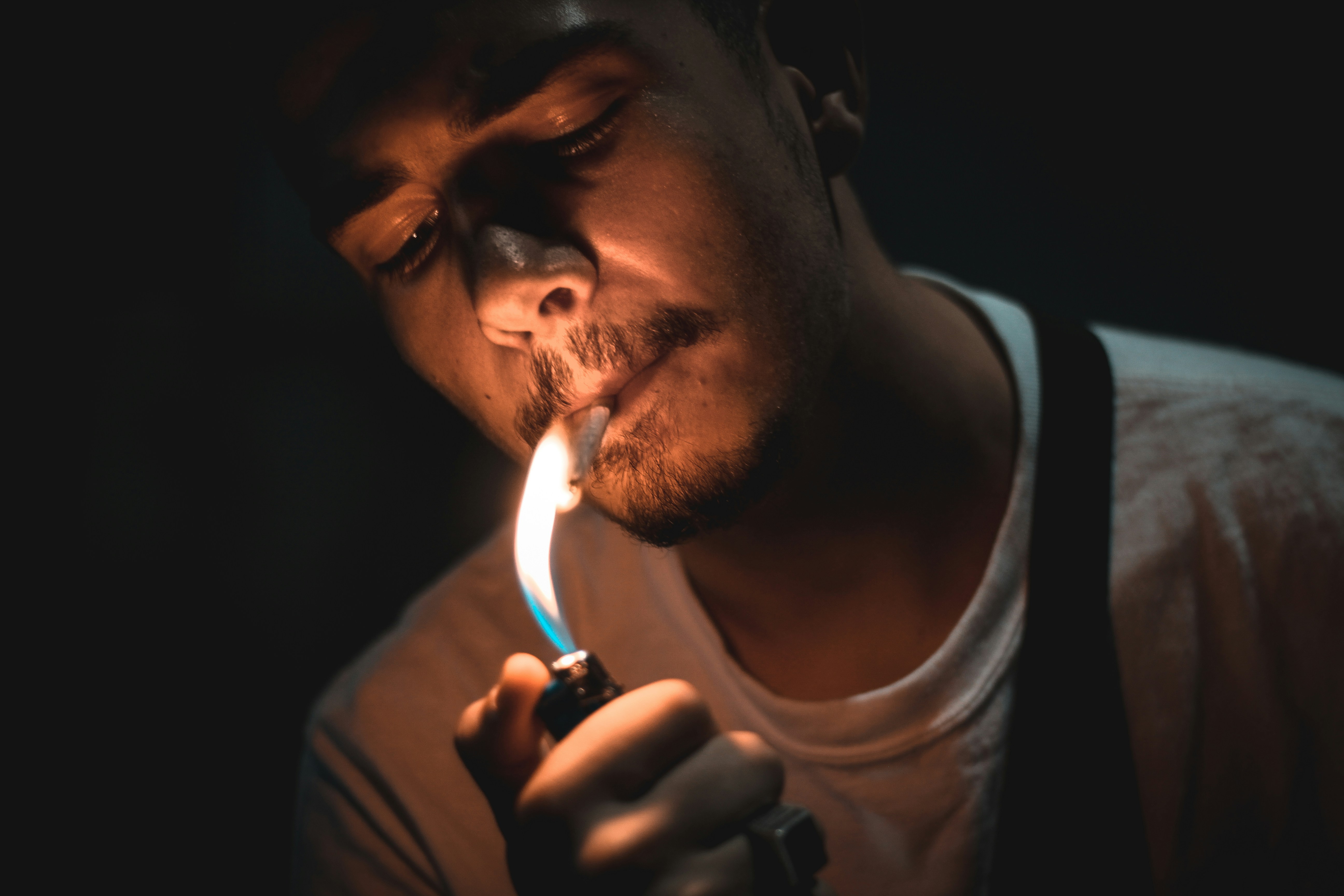 A friend of mine lighting a cigarette in Milan, Italy. - June 2017