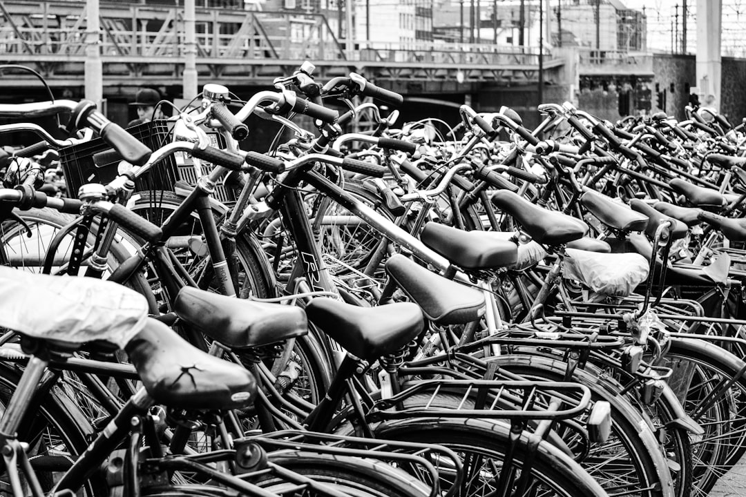 greyscale photography of bicycle display