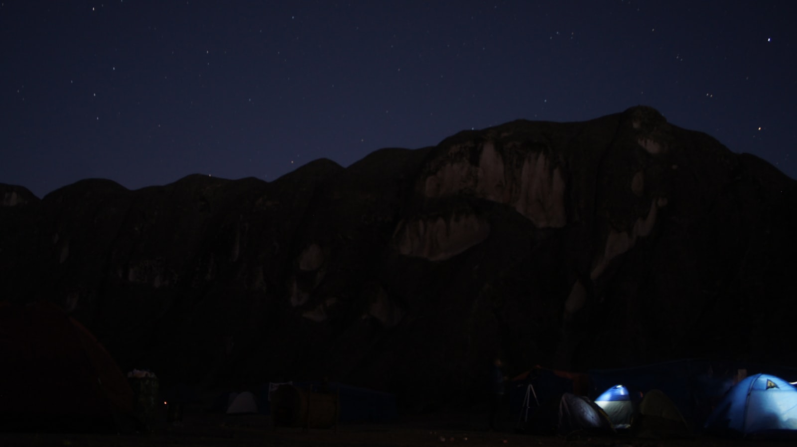 Sony E 18-55mm F3.5-5.6 OSS sample photo. Brown mountain at nighttime photography