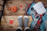 person wearing gray sock standing on stairs