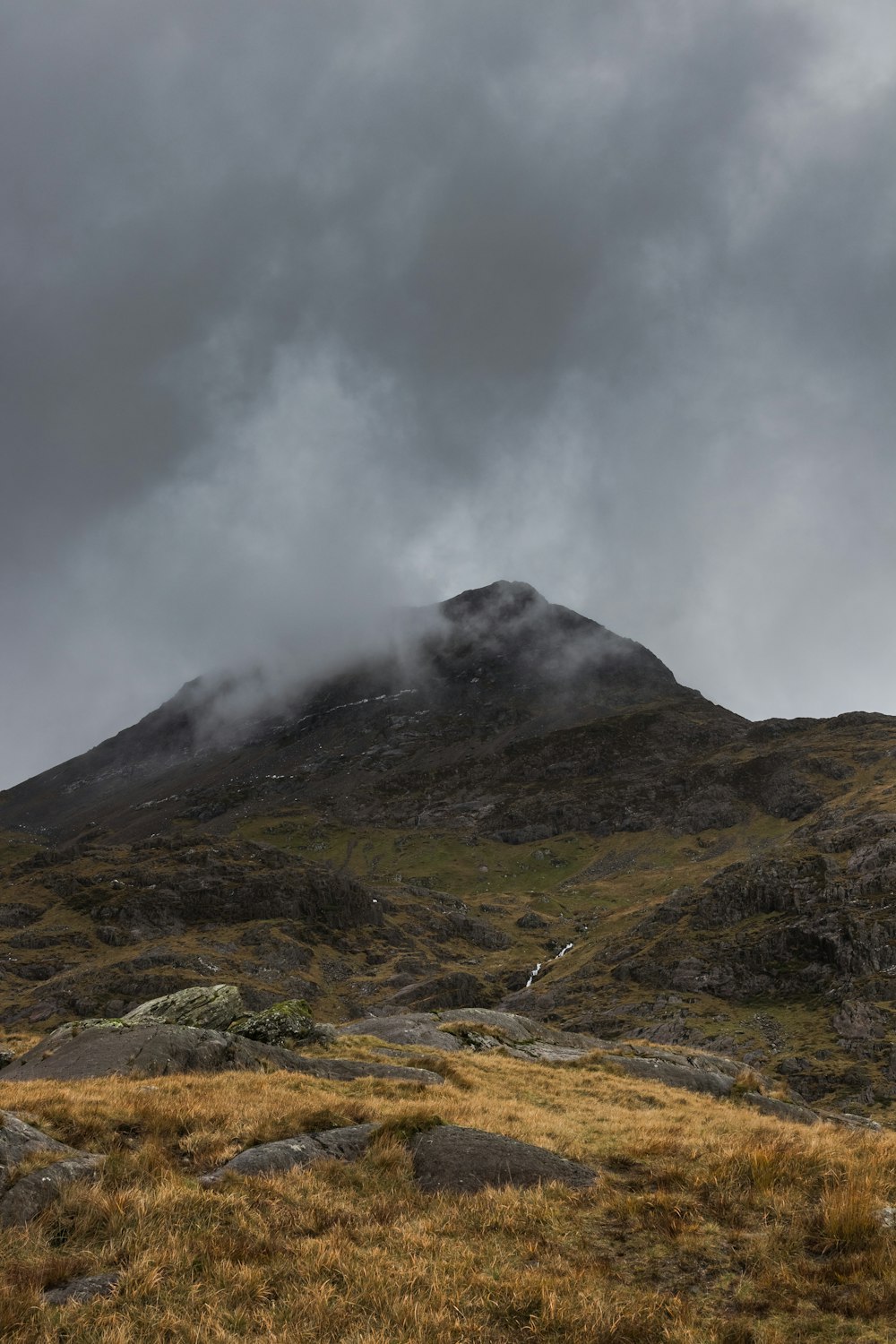 mountain surrounded green grass