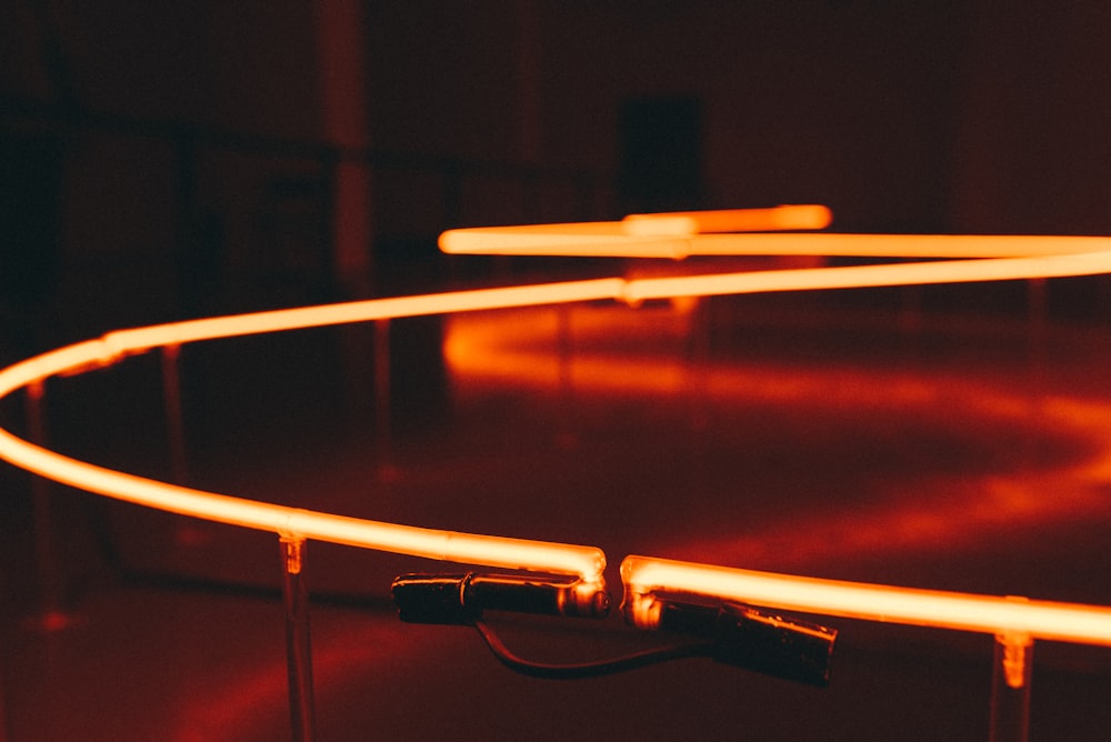 shallow focus photography of red strip lights
