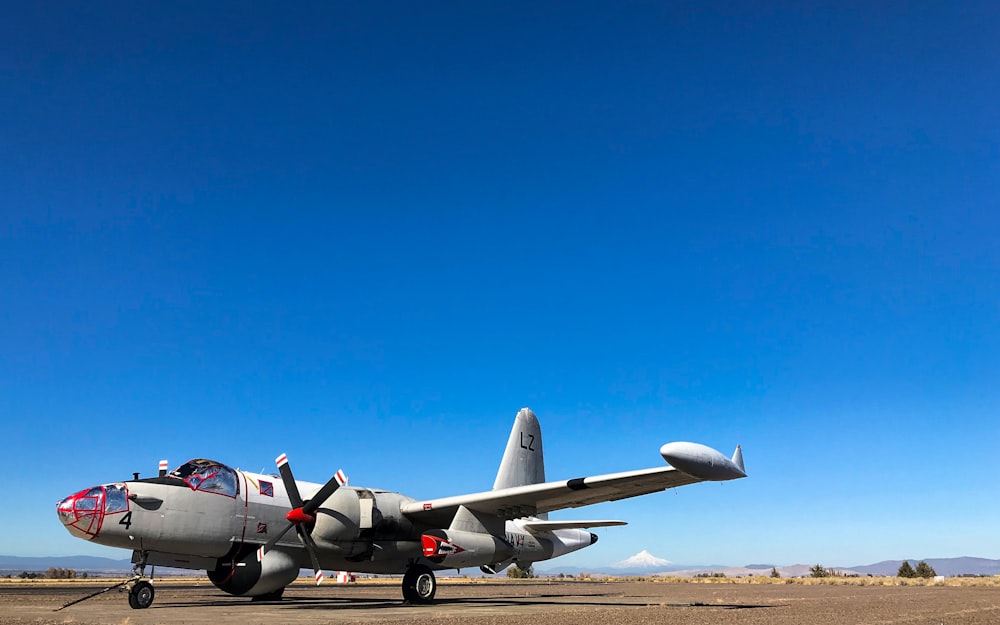 white airplane on land