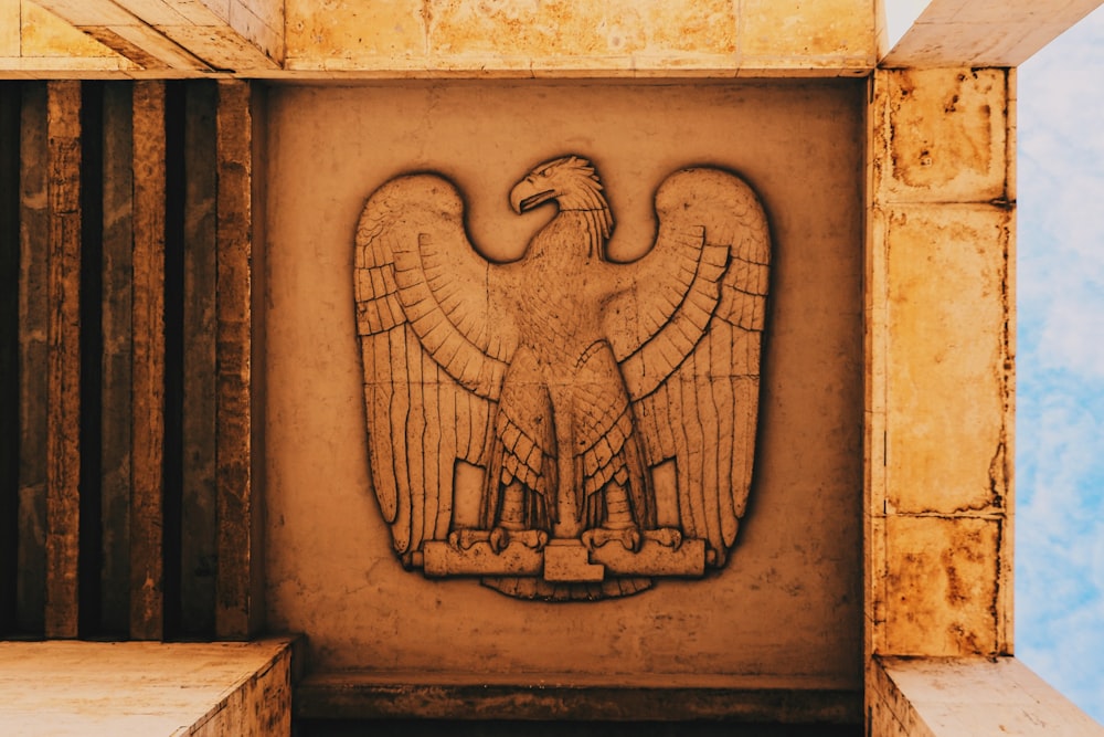 eagle embossed on brown wall