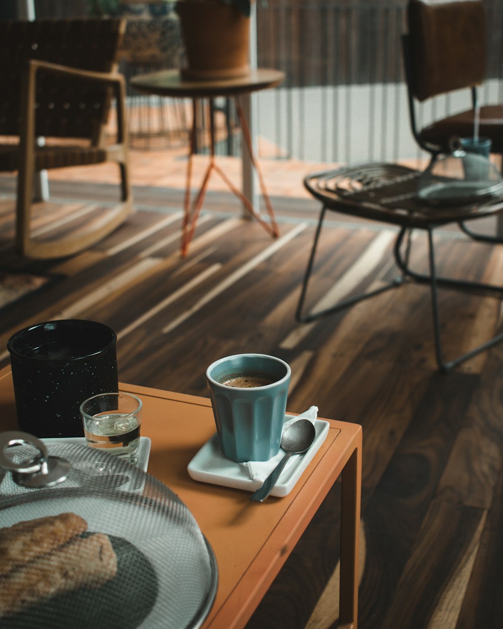 blue ceramic mug on table