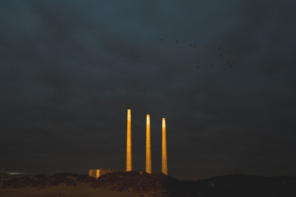 three white concrete towers