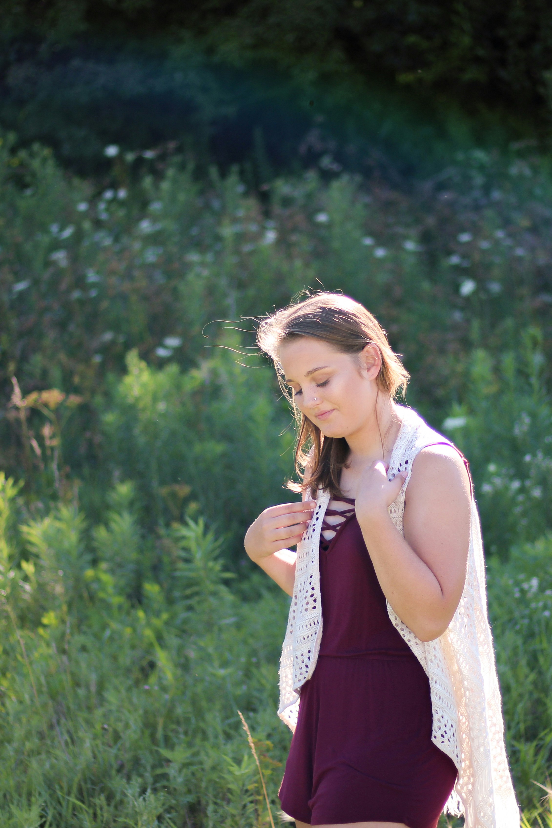 Woman in bohemian romper, outdoor bright fashion lifestyle photography