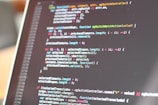 turned on monitor displaying codes