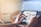A satisfied client reviewing high-quality images on a tablet.