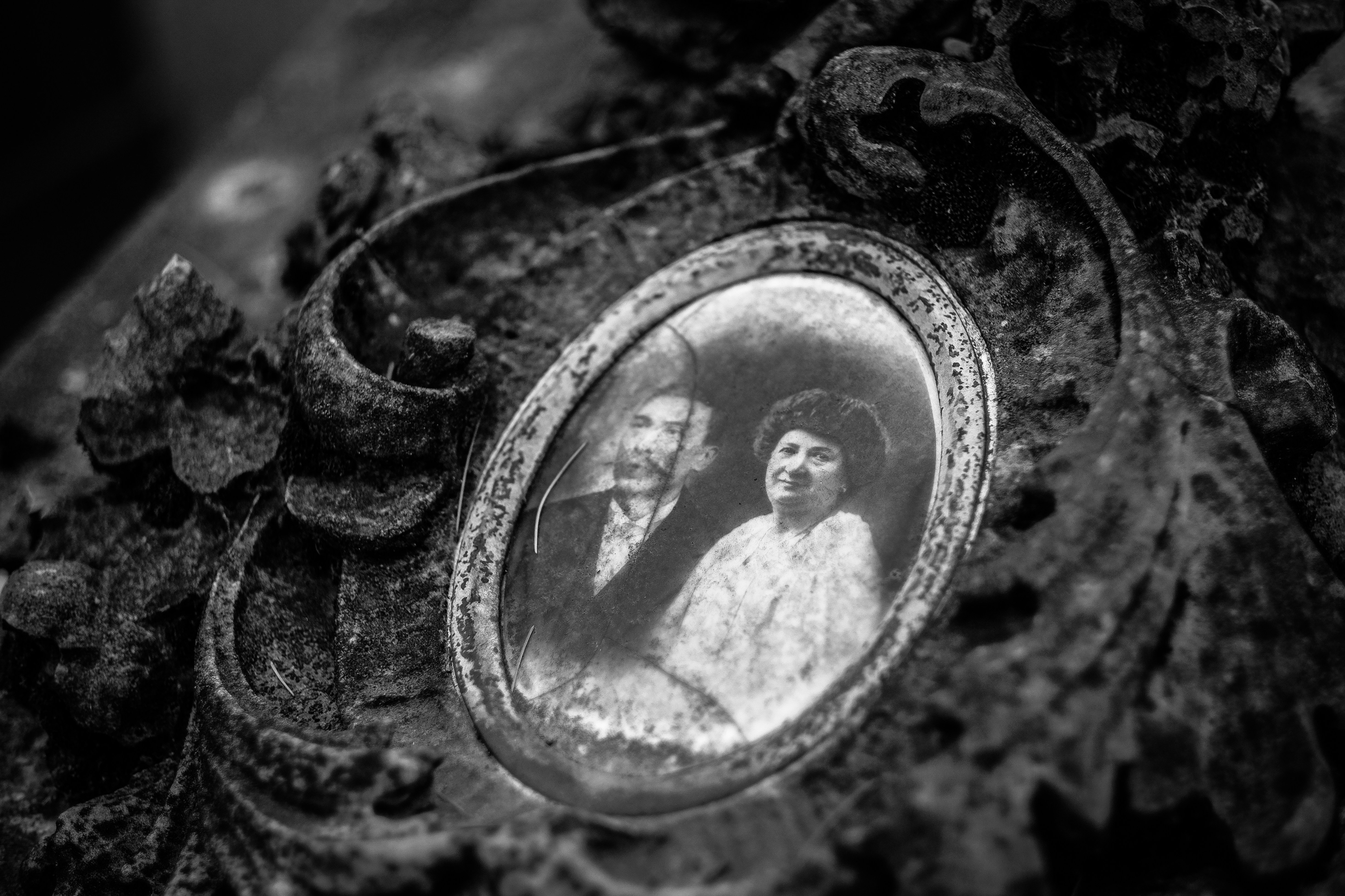 depth photography of grayscale pendant with photo, Ancestors