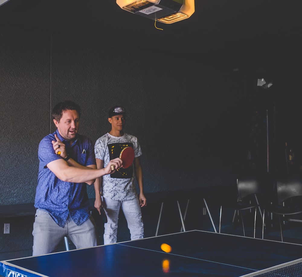 man playing table tennis