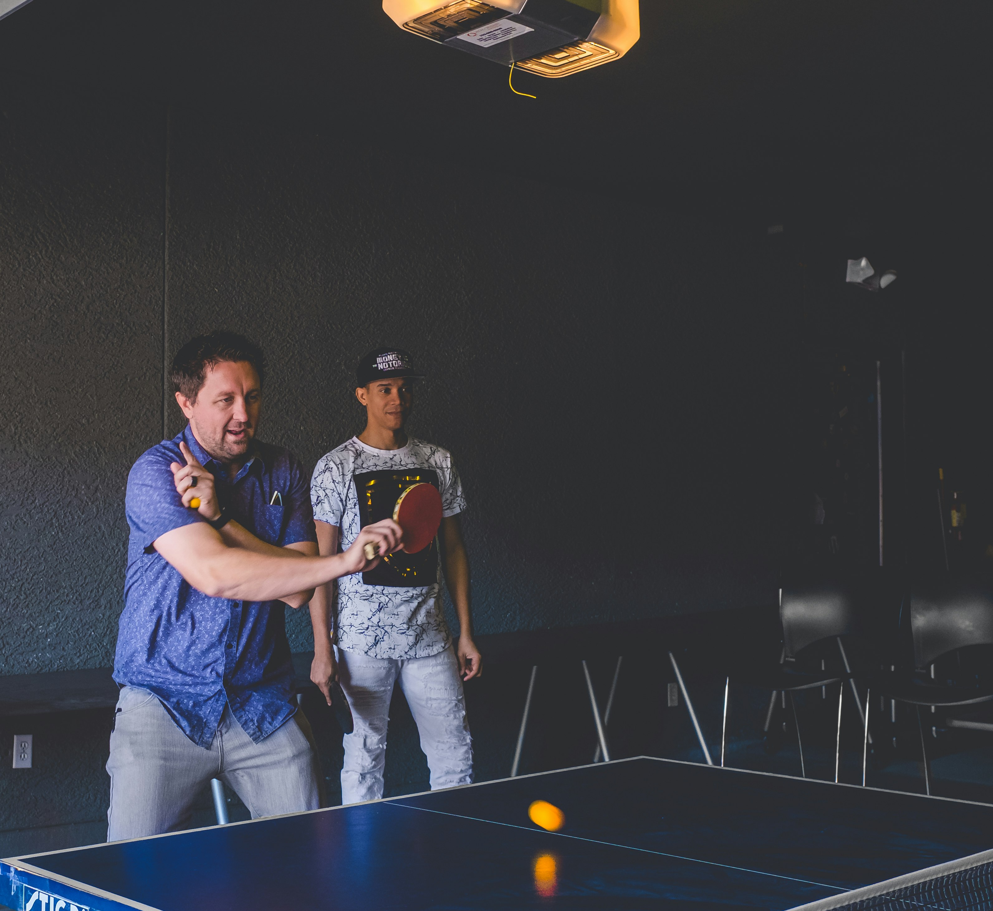 man playing table tennis