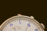 Omega watch face showing delicate hour markers and vintage patina on the dial.