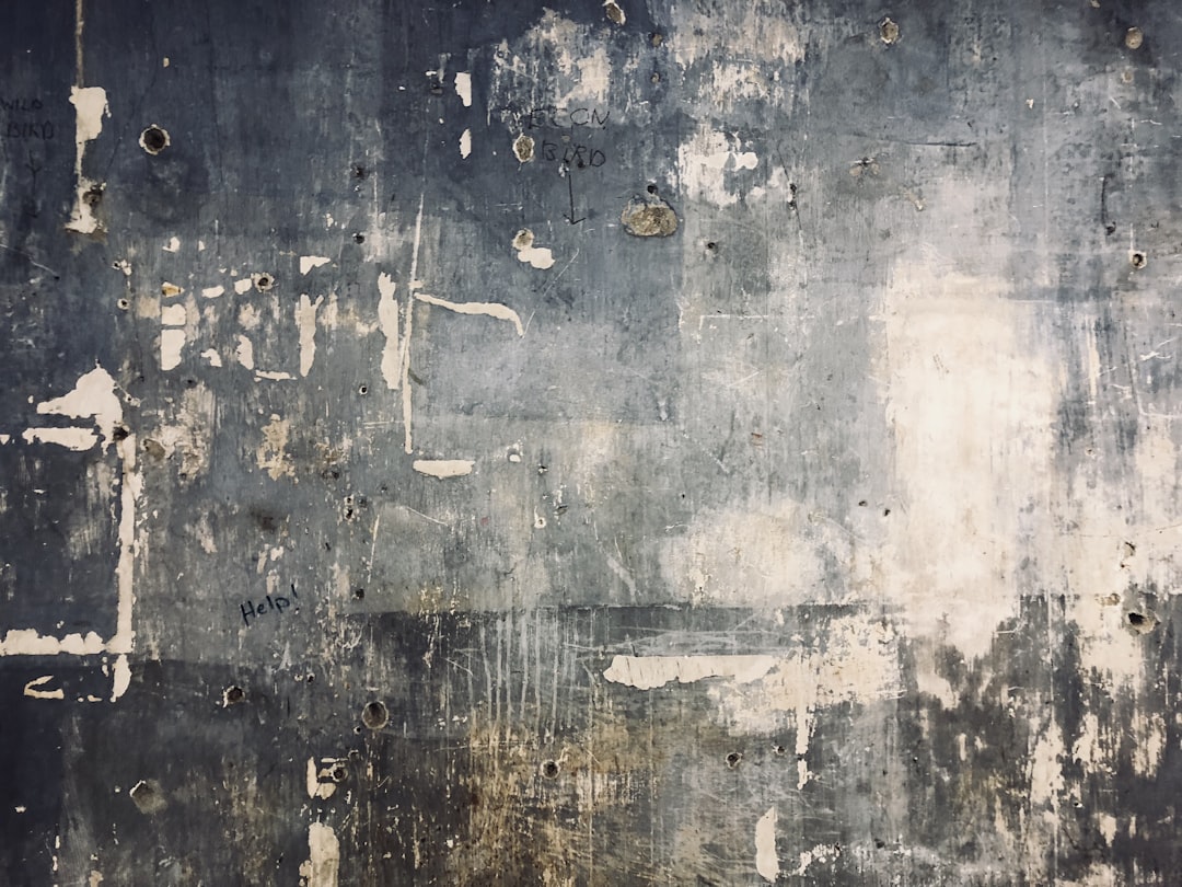 a wall that has some paint on it,