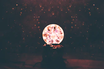 multicolored plasma ball in dim light room