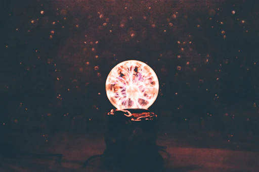 multicolored plasma ball in dim light room