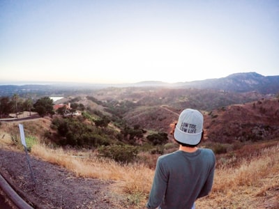 man looking on mountain wanderer teams background