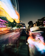 Dynamic event photo with vibrant crowd and sharp shadows.