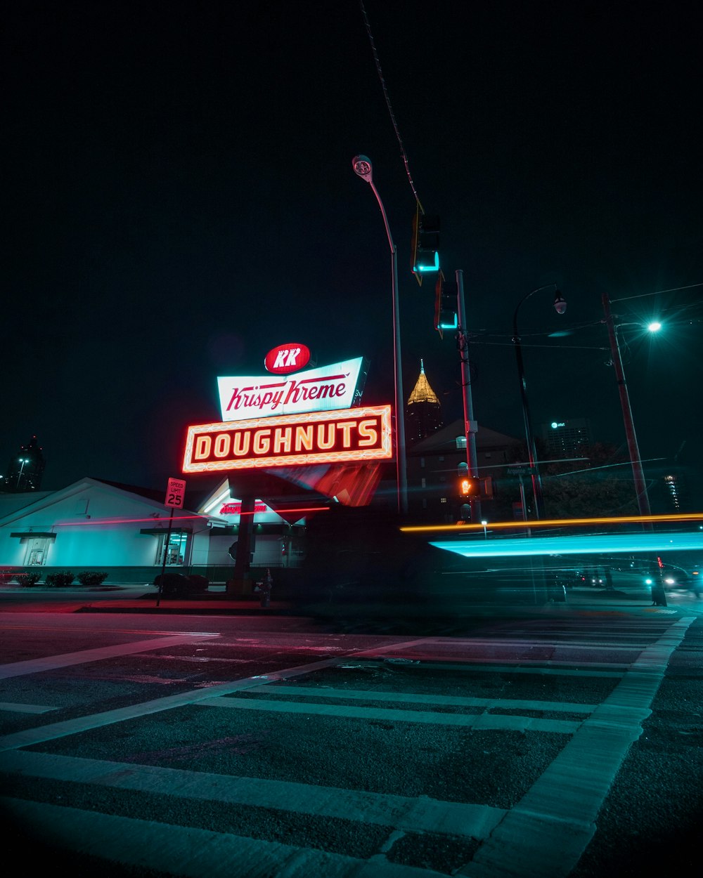 turned on Krispy Kreme Doughnuts neon signage