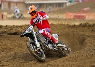 person riding on motocross dirt bike