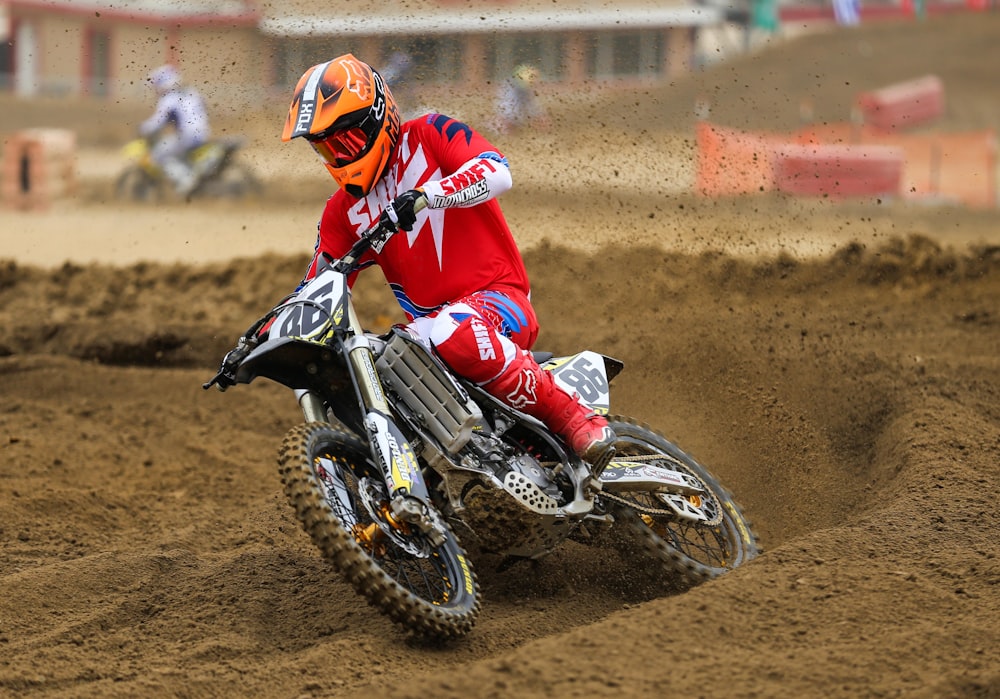 person riding on motocross dirt bike