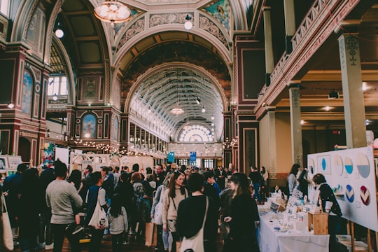 people walking in hallway in Royal Exhibition Building Australia