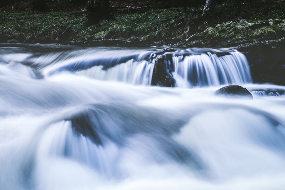 time-lapse photography of waterfalls