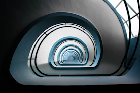 gray and blue concrete tunnel at daytime