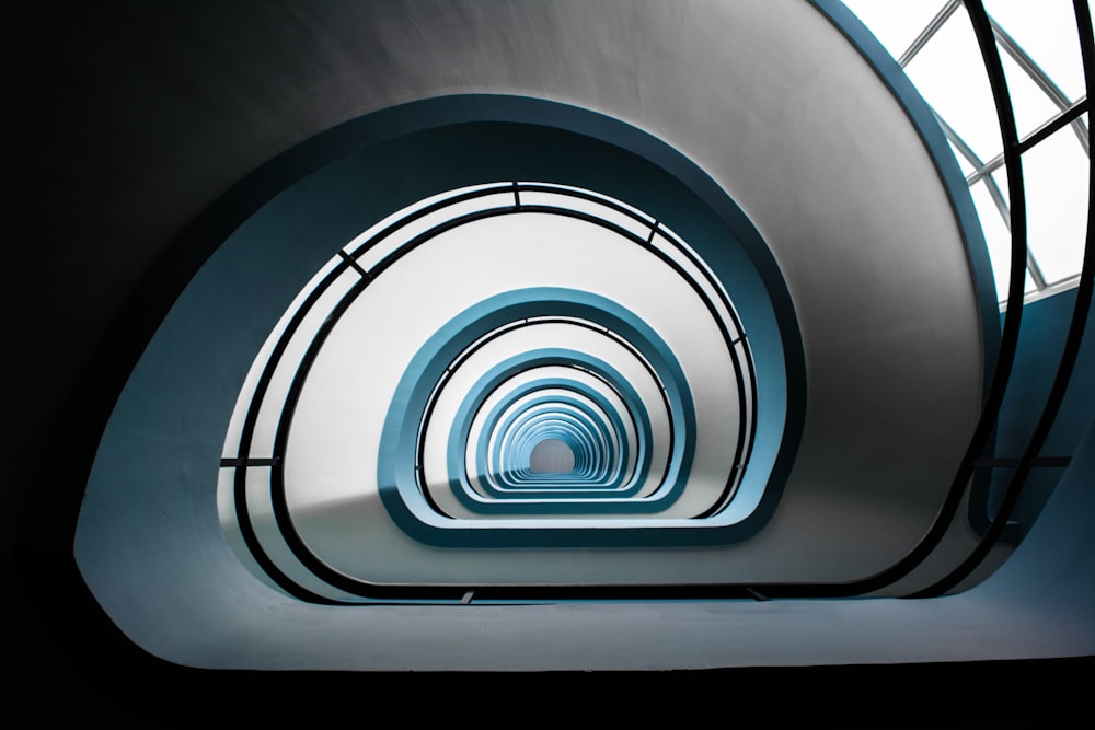 gray and blue concrete tunnel at daytime