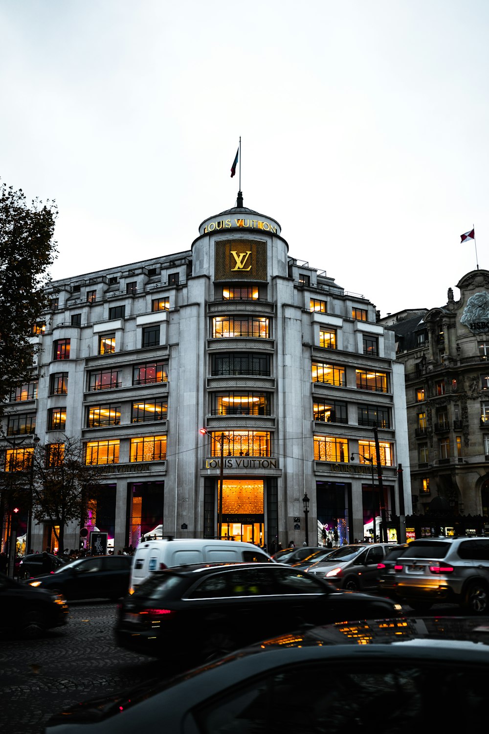 The Louis Vuitton Store Building On The Champs Elysees In Paris