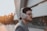 shallow focus photography of man wearing Beats wireless headphones