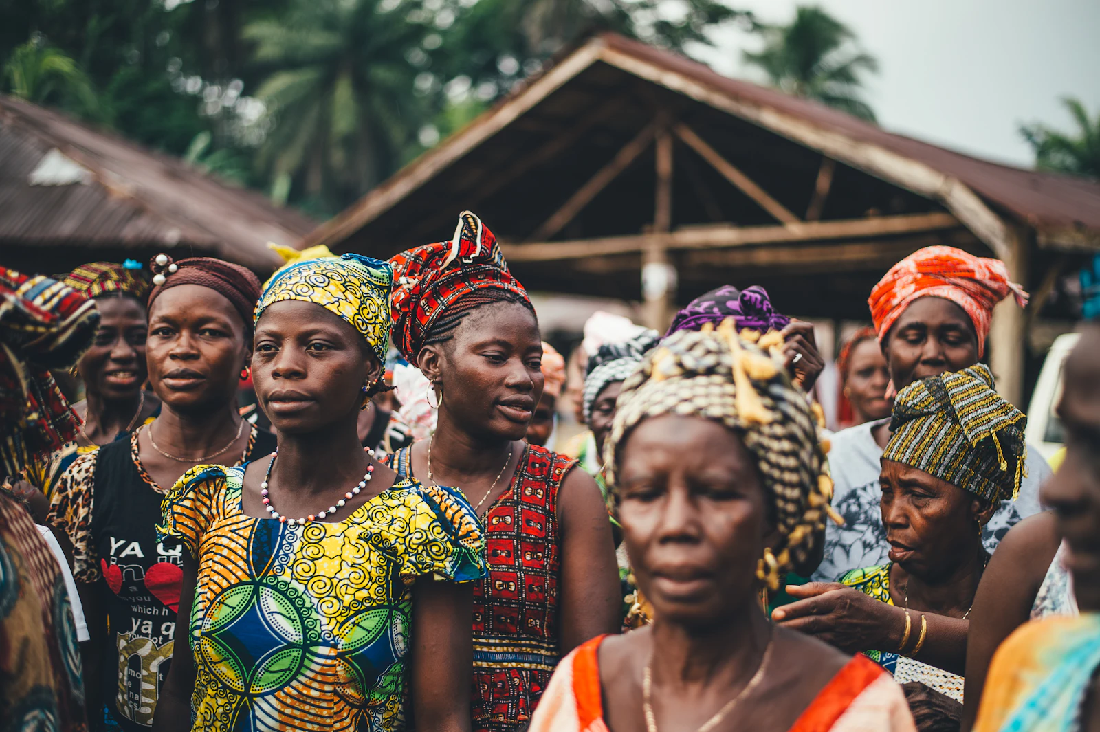 A gathering of people outdoors in a community