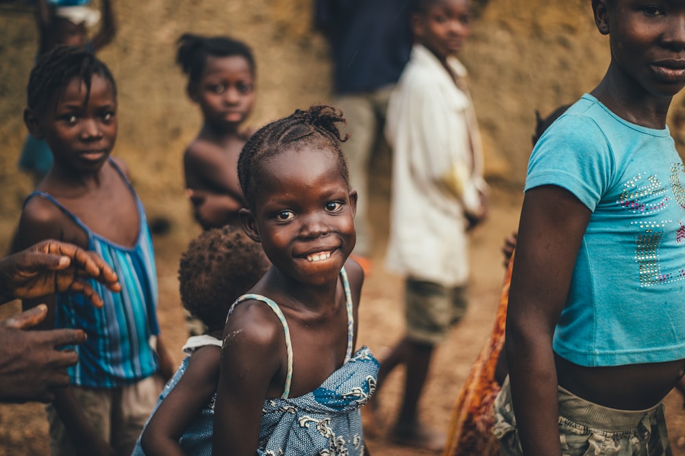 children smiling closeup photography