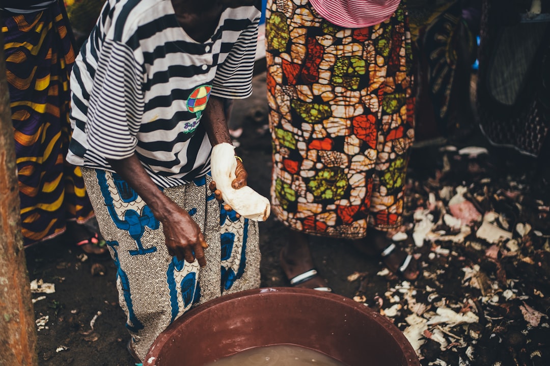 person white cloth near pail