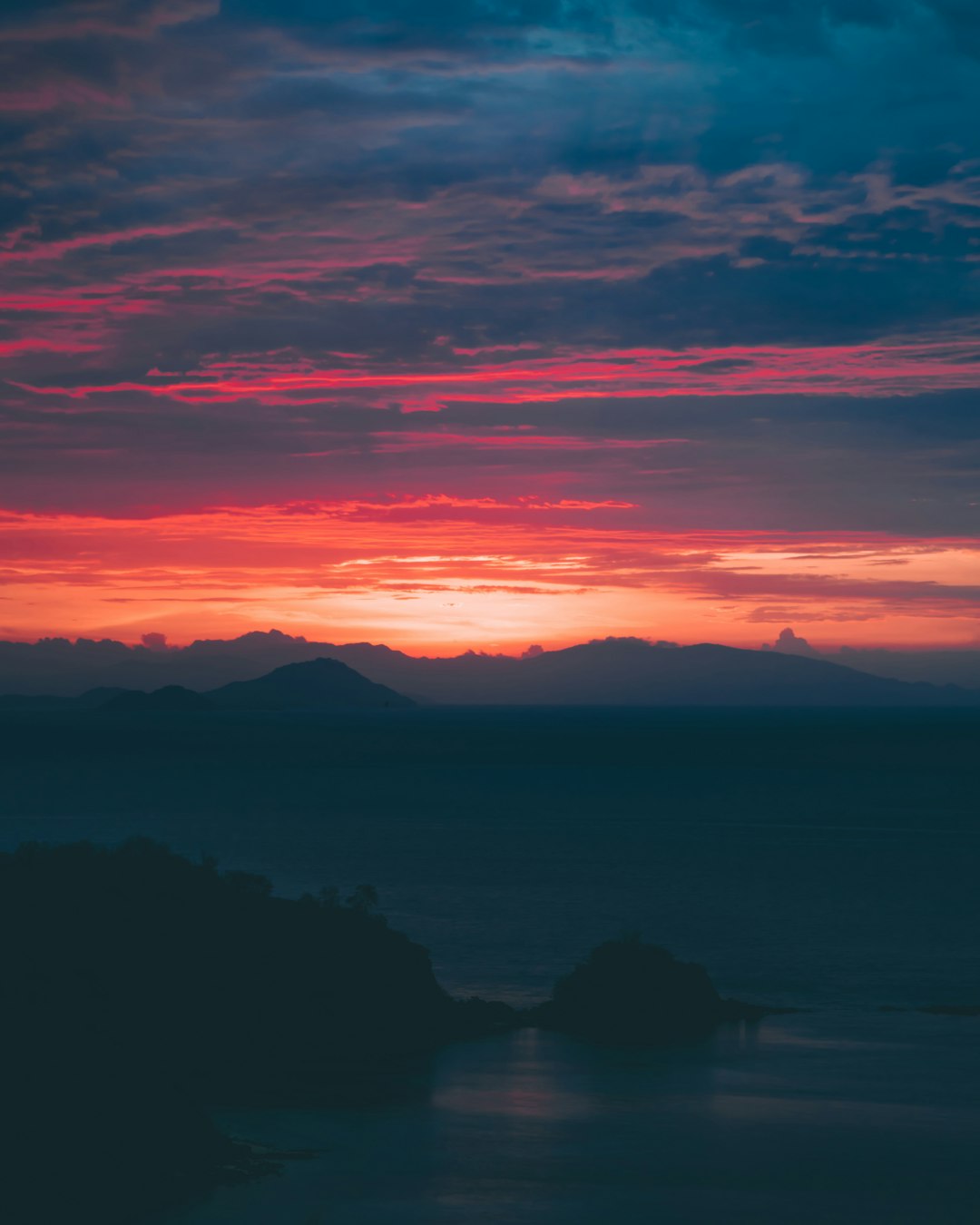 golden hour photo of mountain ranges