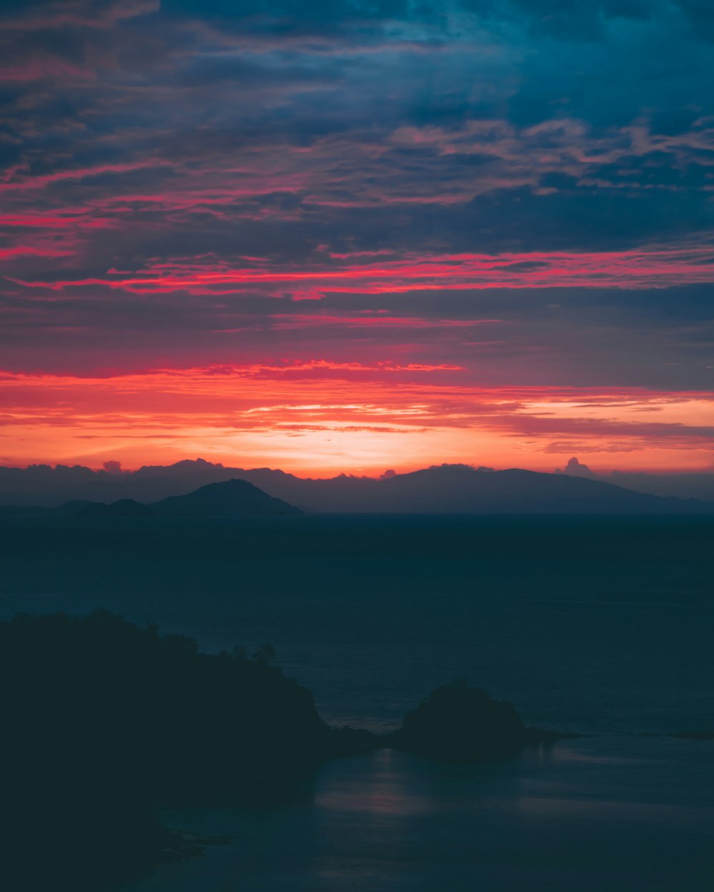 golden hour photo of mountain ranges