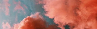orange smoke on blue background