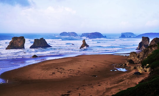 sea waves splashing on rocks in Bandon United States