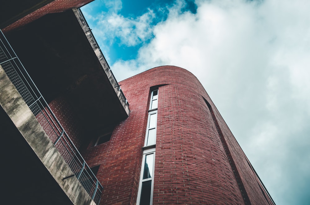 low angle photography of clay brick building